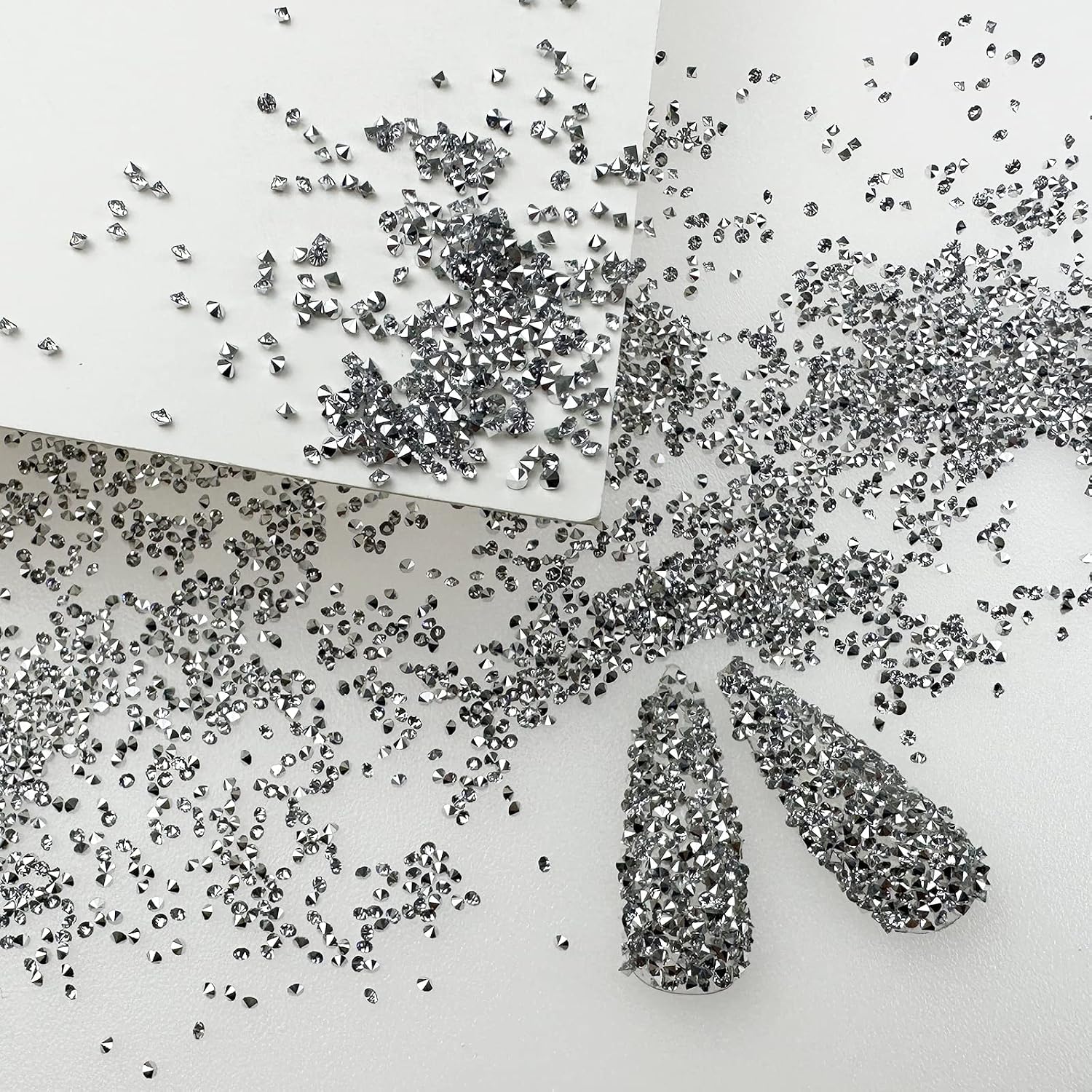 HUETFAT 8800Pcs Silver Pixie Nail Crystals Rhinestones-1.2mm Micro Gems Glitter Beads for Nails-Mini Sand Nail Diamonds Stone Swarovski Shine-Sugar Glass Crystals Tiny Jewels Bling Charms for Nail Art